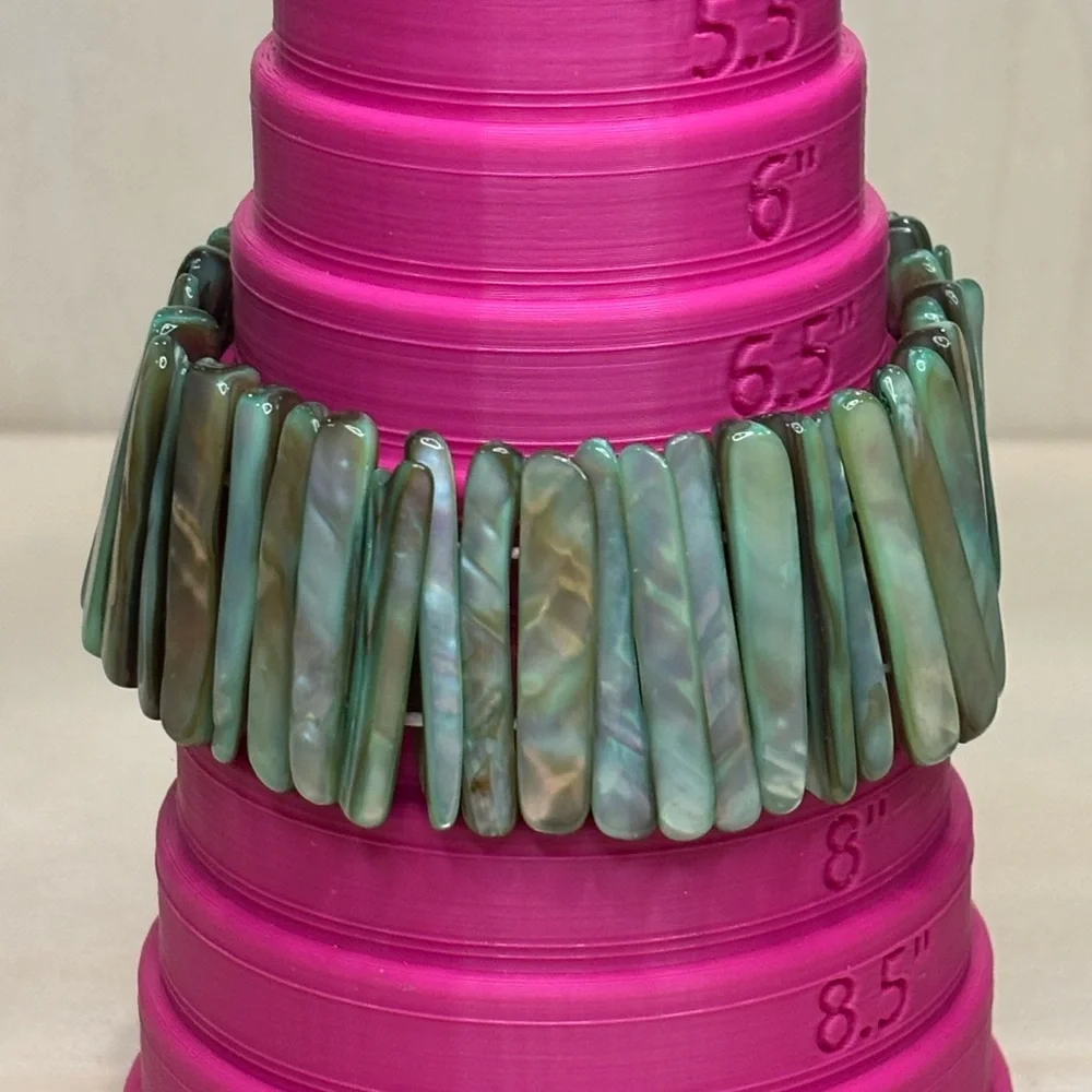 Mother of Pearl Abalone Shell light green shades panel stretch bracelet.